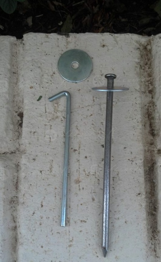 6" steel nails with a washer